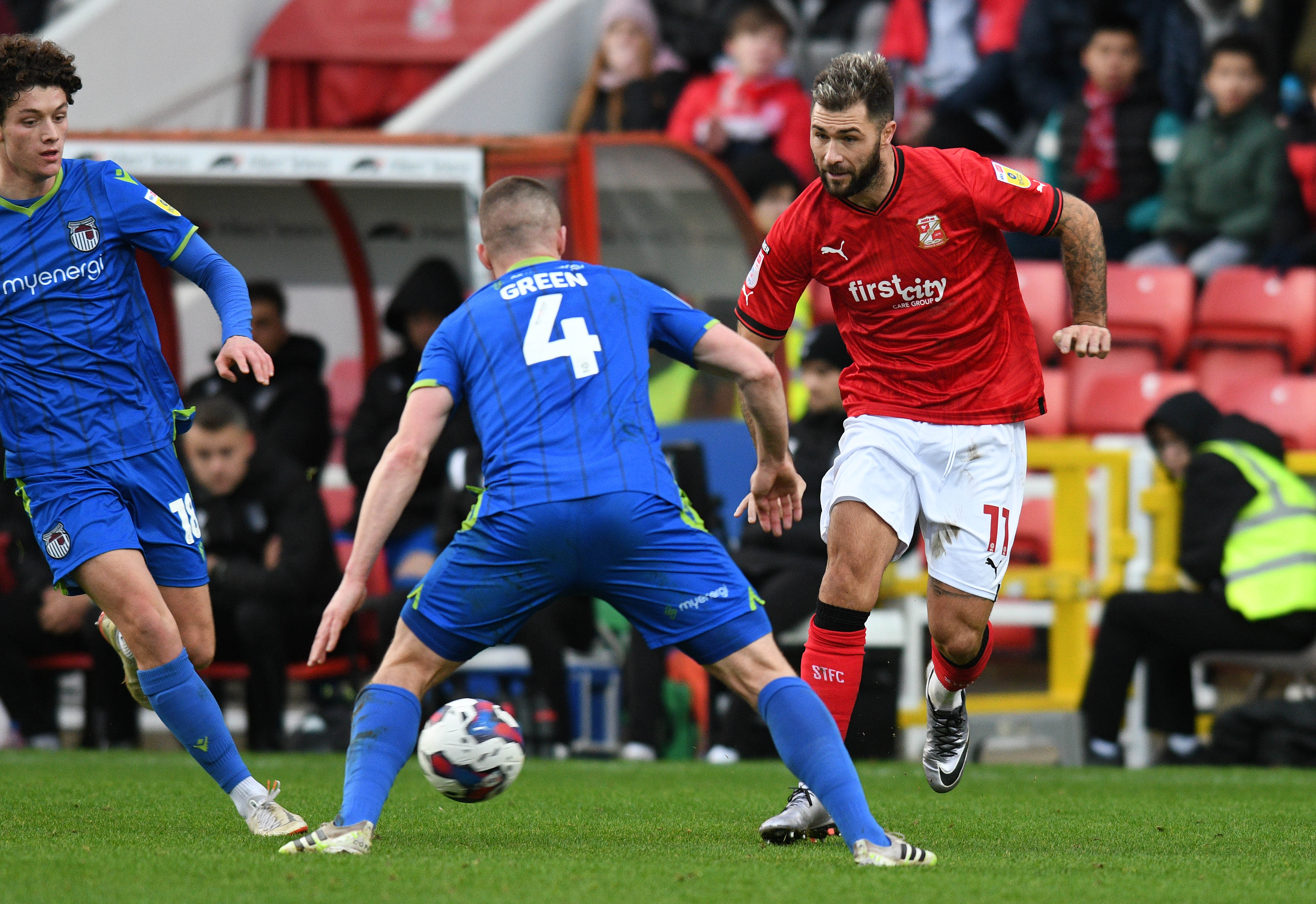 Charlie Austin and Gavin Gunning said that Swindon being less patient was key to success against Grimsby
